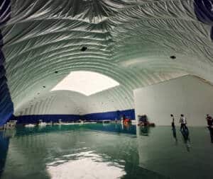 Inflatable storage tents